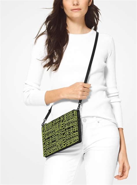 Adele Newsprint Logo Leather Crossbody Bag .